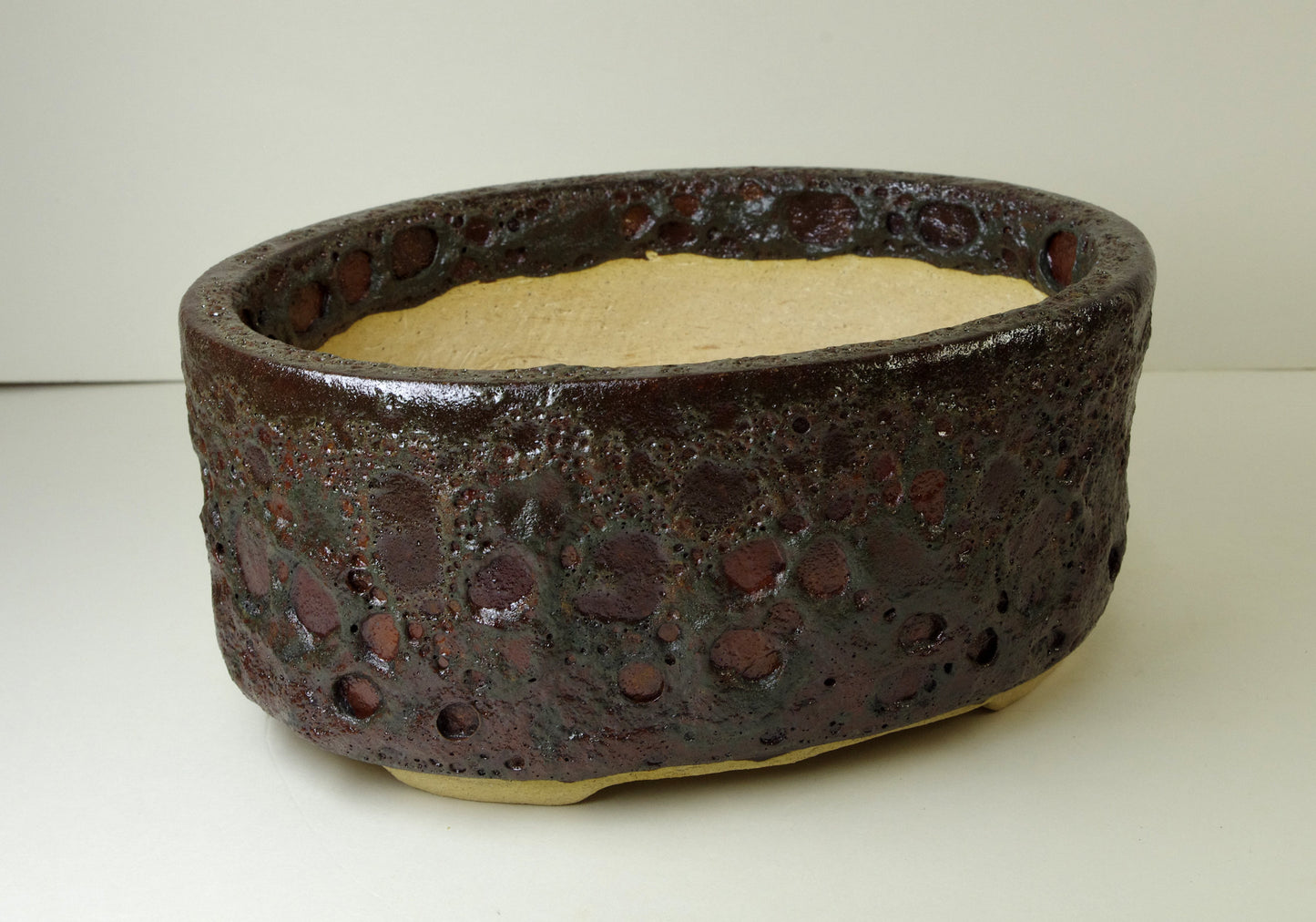 12104 Handmade Oval Stoneware Bonsai Pot, Reddish Browns Textured Crater Glaze, 8 1/4 x 6 1/2 x 3 5/8