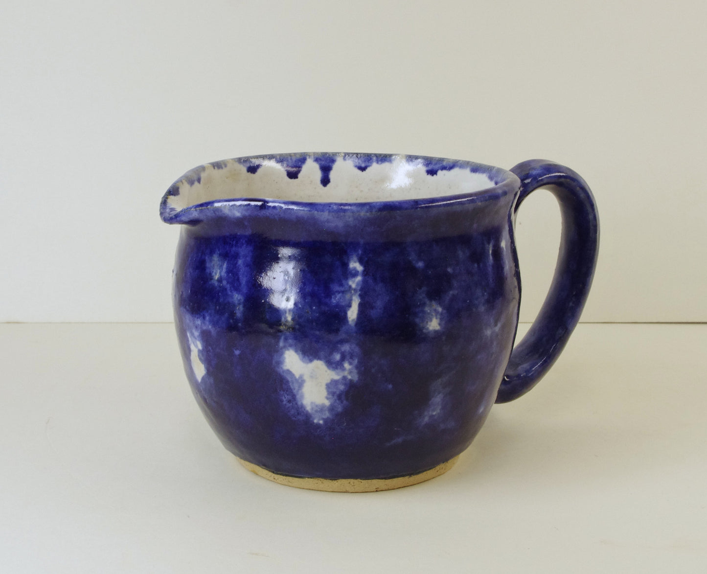 2108, Hand Thrown Stoneware Pitcher, Blues, 4 1/4 x 4 1/2 Inches