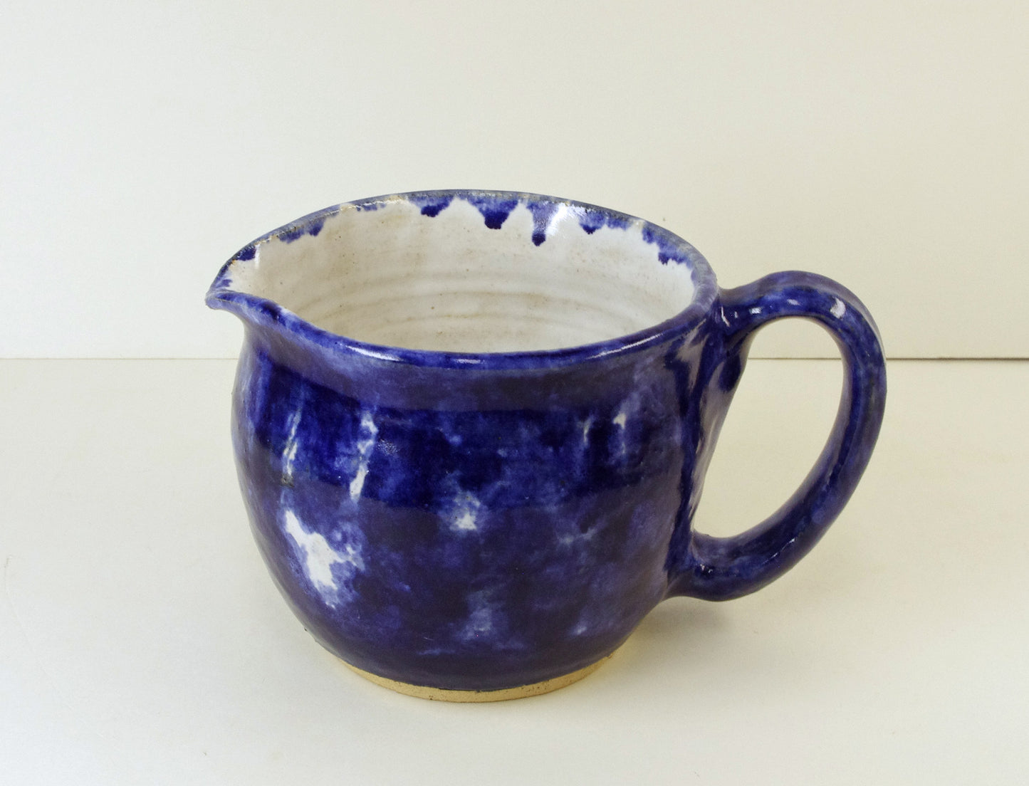 2108, Hand Thrown Stoneware Pitcher, Blues, 4 1/4 x 4 1/2 Inches