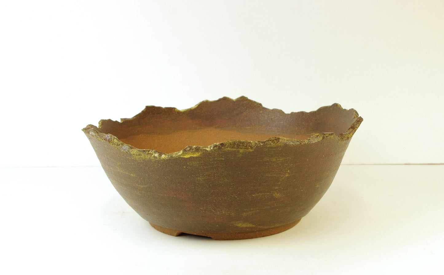 2049, Hand Thrown Stoneware and Altered Bonsai Pot, Extra Wire Holes, Brown and Yellow Ochre 7 1/4 x 2 3/8 to 2 7/8
