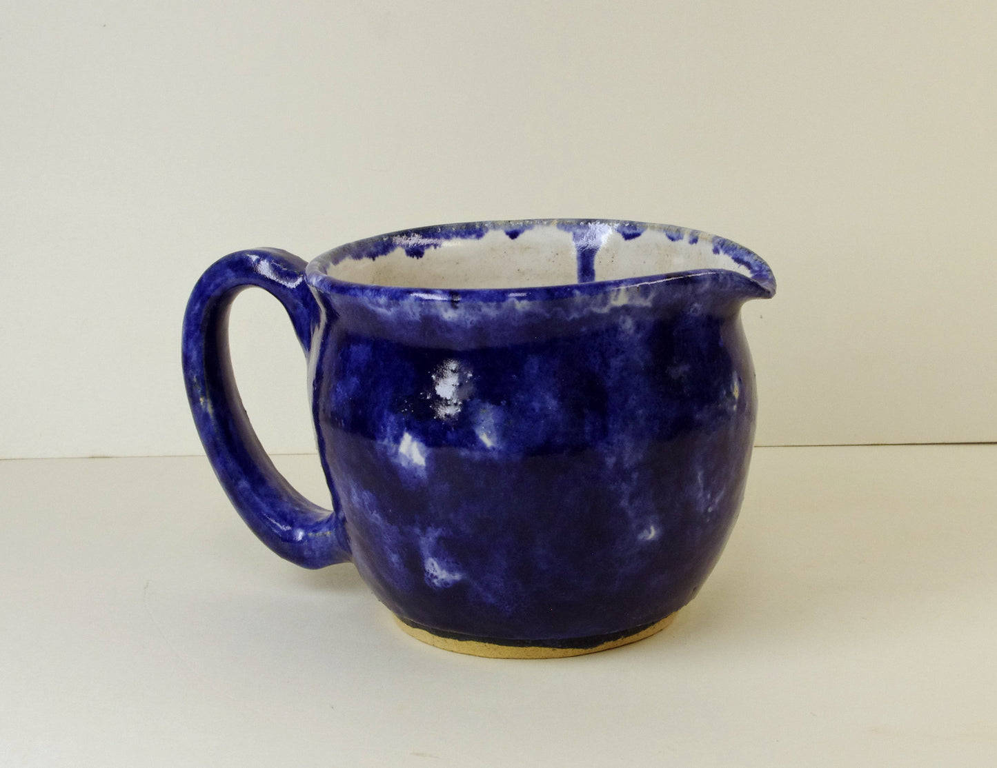 2108, Hand Thrown Stoneware Pitcher, Blues, 4 1/4 x 4 1/2 Inches