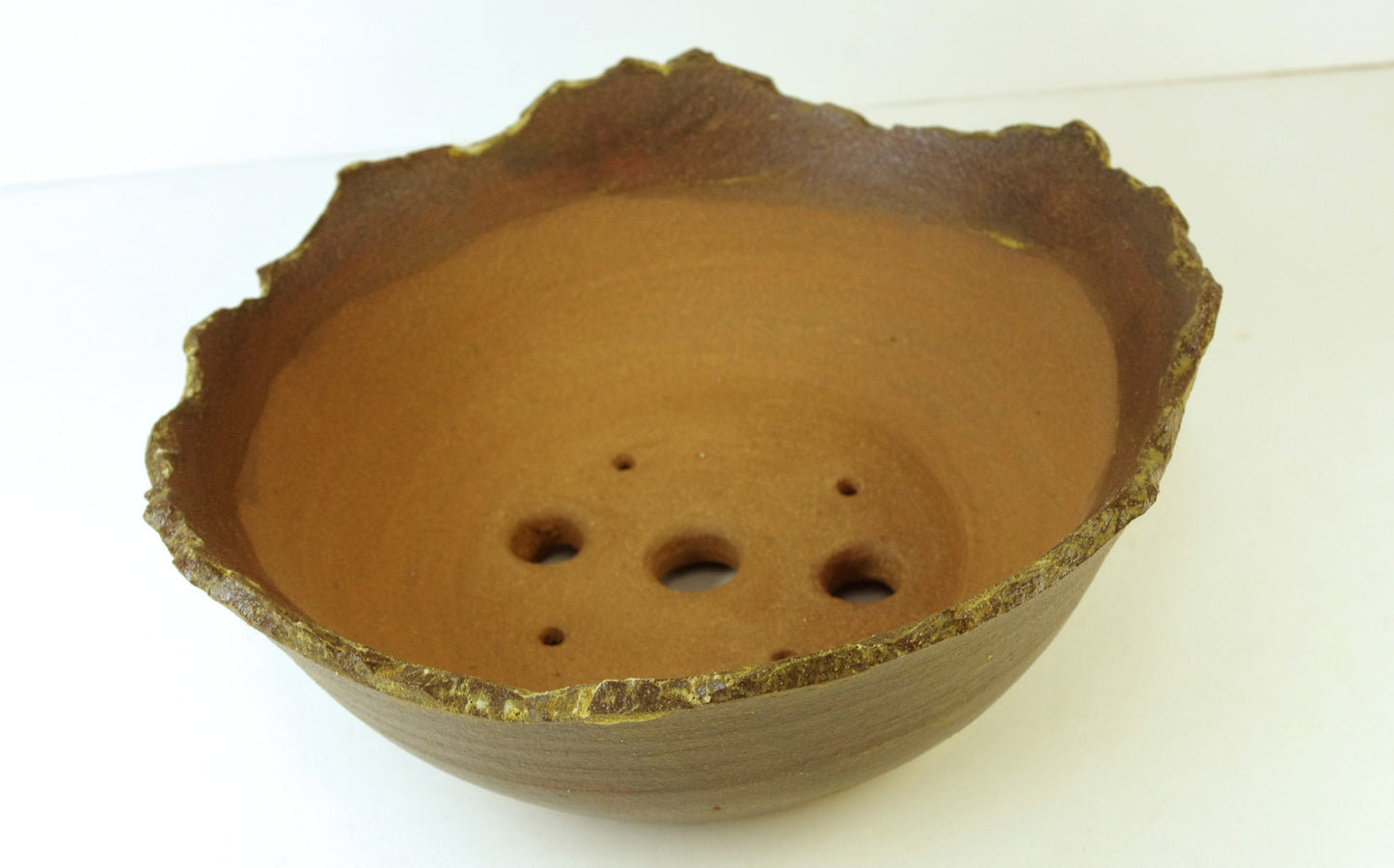 2049, Hand Thrown Stoneware and Altered Bonsai Pot, Extra Wire Holes, Brown and Yellow Ochre  7 1/4 x 2 3/8 to 2 7/8